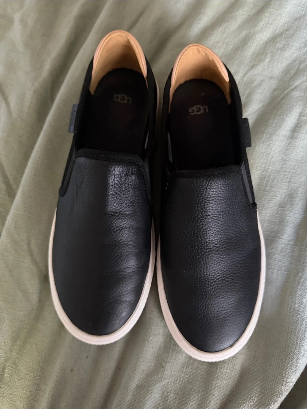 UGG Women’s Black Slip-On Leather Sneakers